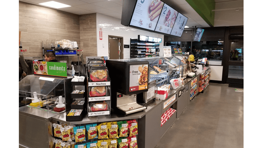 Indoor image image of 7-11 showing condiment and hot foods station.