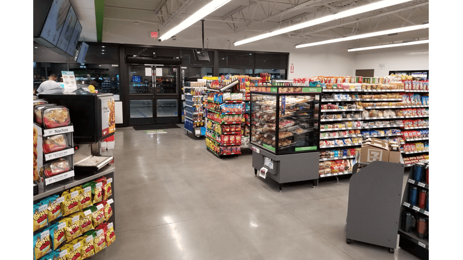 Indoor image image of 7-11 baked goods and various aisles.
