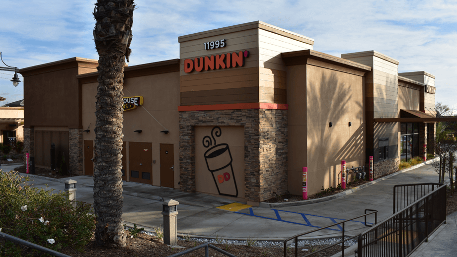 Outdoor image of the back of Dunkin Donuts.