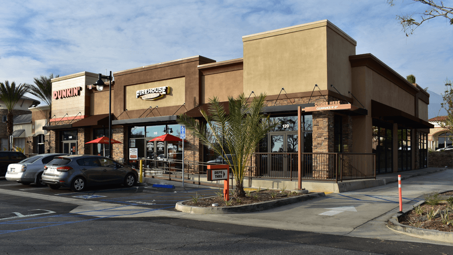 Outdoor image of the side Dunkin Donuts showing the entire building.