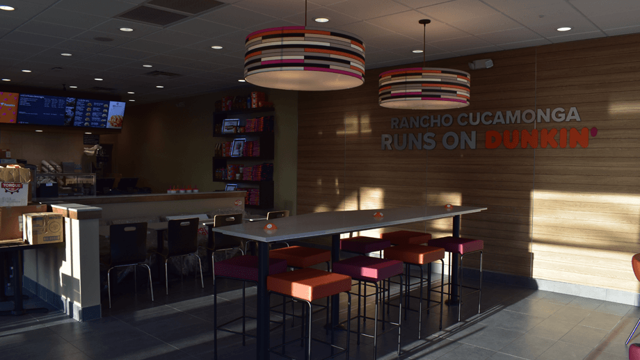 Indoor image of Dunkin Donuts showing the dining area.