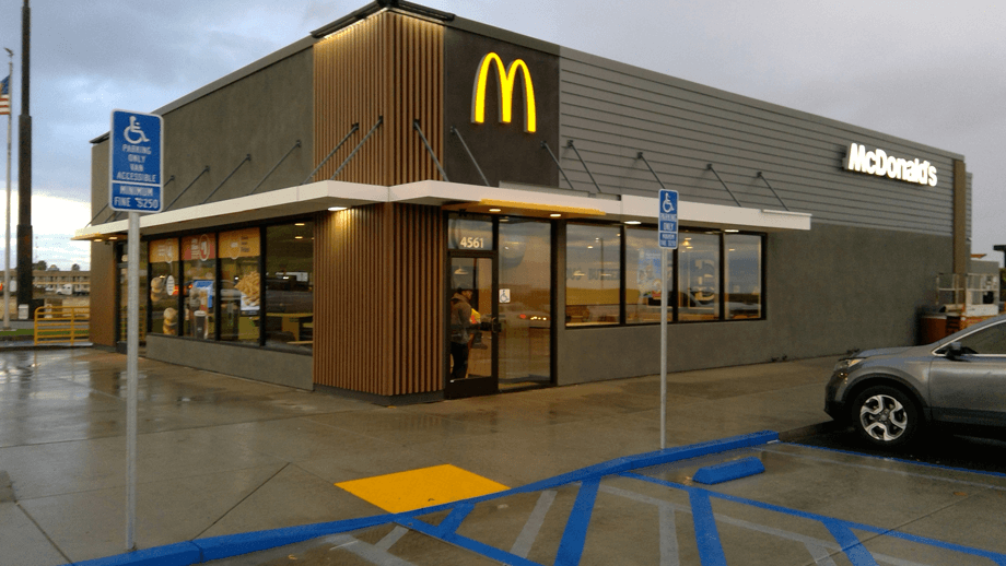 Outdoor image of McDonalds showing the main entrance door way.